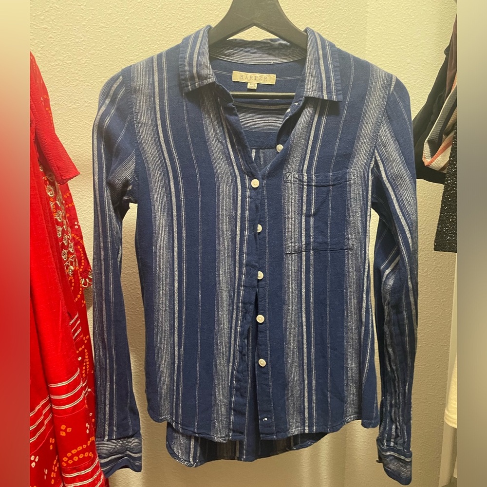 Francesca’s blue stripped button down shirt